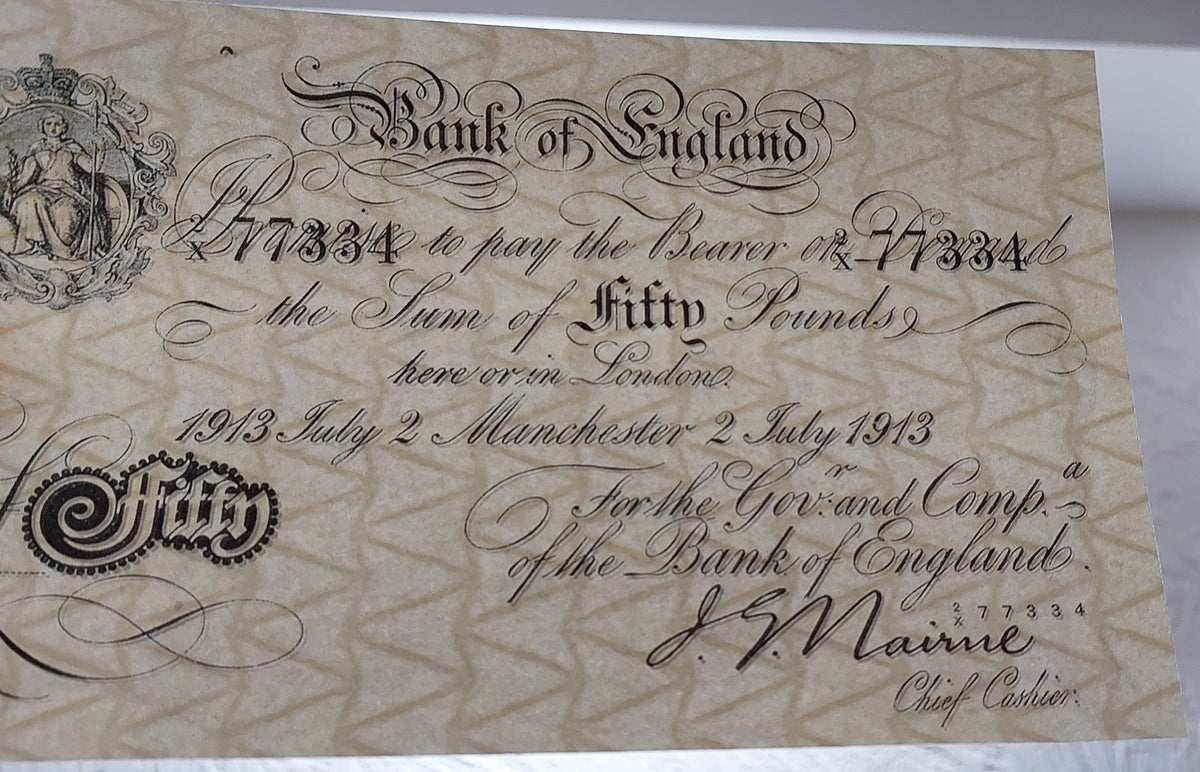 Single-note close-up highlighting the copperplate calligraphy, Chief Cashier signature block, and Manchester branch designation on the 50 Pounds note