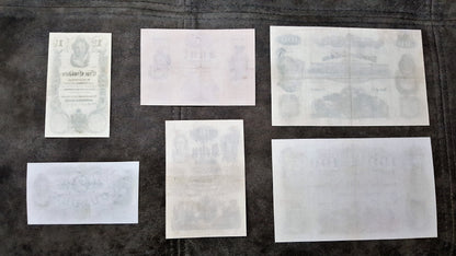 Reverse texture and uniface backing details of Austrian Empire 1847-1848 Gulden bank notes. Showcases traditional numismatic document paper fibers and early anti-counterfeiting ink bleed-through profiles.
