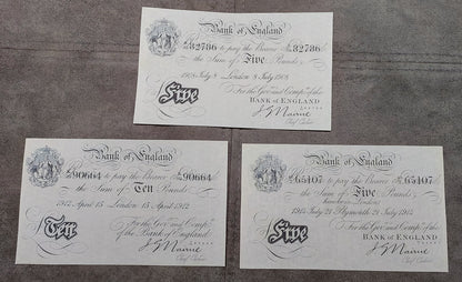 Two-note stacked layout (pair) comparing obverse typography, Britannia vignette, and signature placement on the 1 Pound Specimen and 10 Pounds London note.
