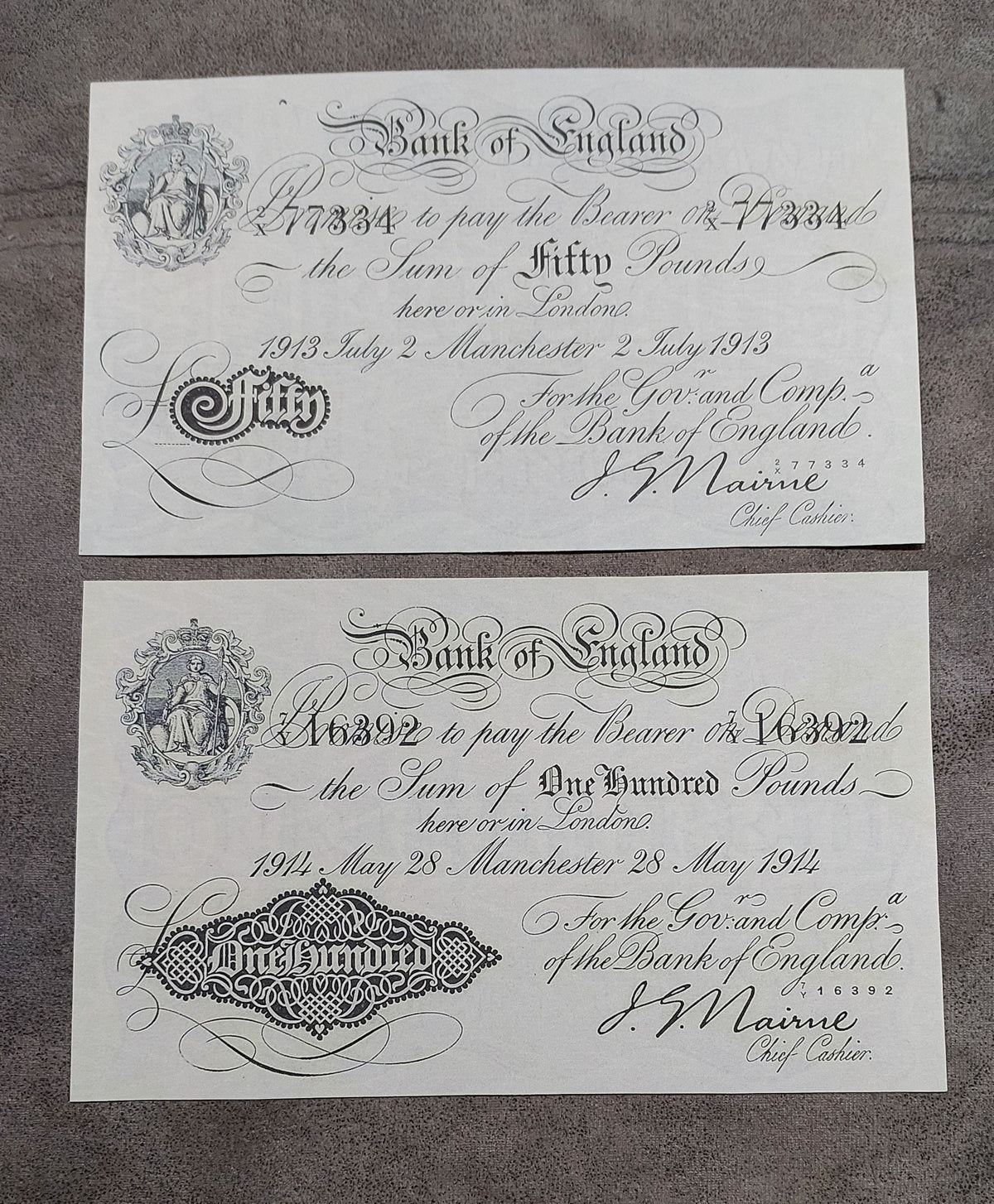 Detailed single-note view showcasing the top-denomination 100 Pounds White Note issued at the Manchester branch in 1914.