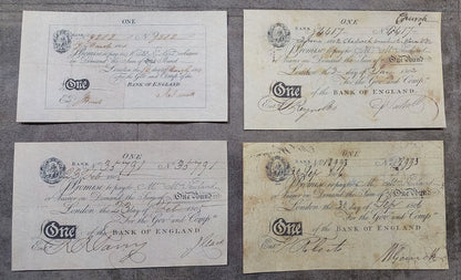 Bank of England early 1800s historical 1 Pound notes covering the years 1801, 1802, 1805, and 1809. Features the signature Napoleonic Wars emergency currency architecture, complete with dark ink contrast, ornate numeral denominations, and rare cashier signature variants.