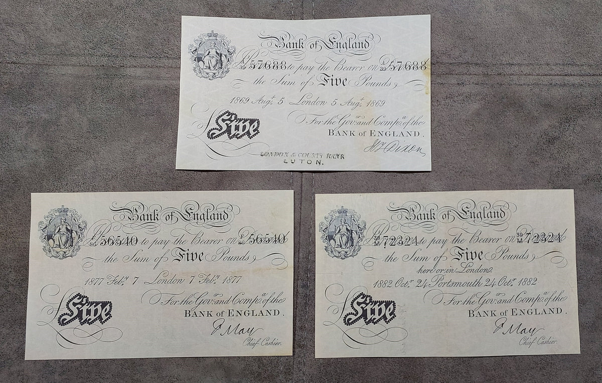 Late Victorian era Bank of England 5 Pounds and 10 Pounds white notes issued between 1868 and 1882. Displays the transition into highly standardized security printing, crisp serial number numbering fonts, and clean layout geometry.