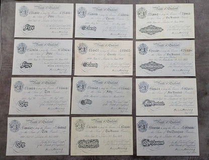 Full lot overview displaying all 12 historical Bank of England White Notes (1918–1925) arranged in a structured 3x4 grid.