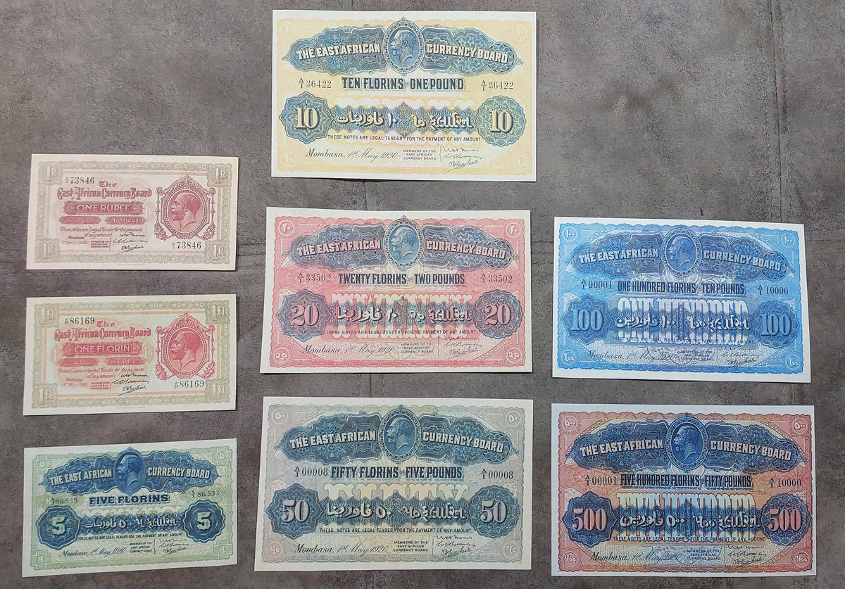 Full lot overview displaying all 8 East African banknotes from the 1920 Rupee and Florin currency series.