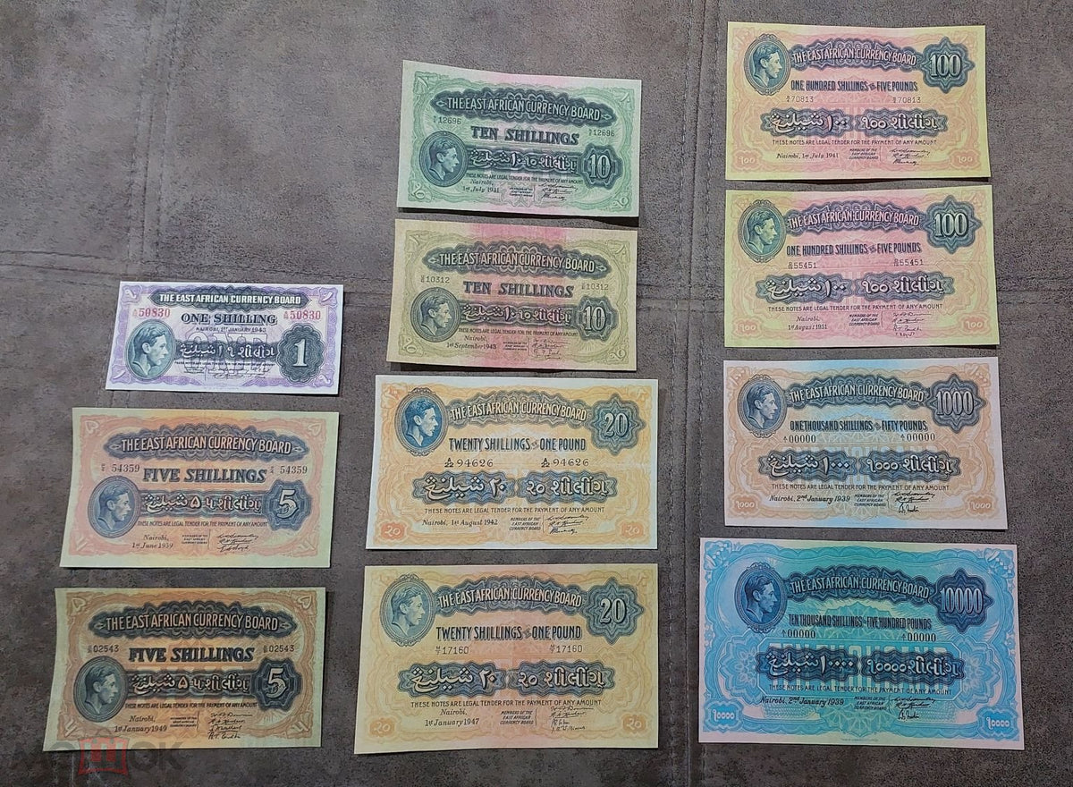 Complete lot overview showcasing all 11 historical East African Shilling banknotes (1938–1952) displayed together.