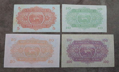 Four-note grid layout (quartet) showing the back/reverse side designs and guilloche patterns for the 1953–1956 issue notes.