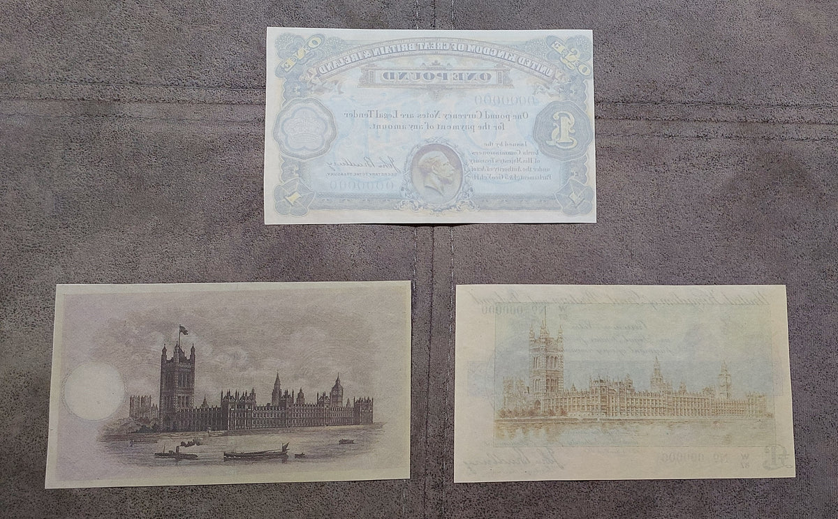 Reverse side profiles of the British WWI 1 Pound proof banknotes. Exhibits the unique textural qualities of historical security rag paper and structural counterfeit prevention watermark lines.