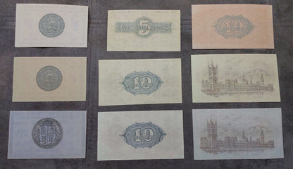 Obverse view of Great Britain 1919 Treasury Shilling notes. Displays early King George V numismatic layouts, fine line-engraved borders, and prominent Warren Fisher signature placements highly sought after by British paper money researchers.