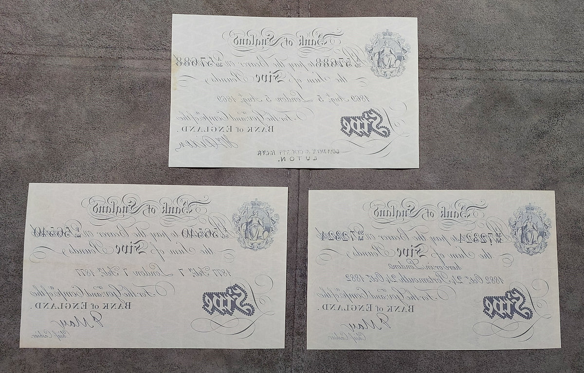 Reverse angles of late Victorian Bank of England currency. Showcases traditional numismatic aging aesthetics, watermark placement verification zones, and historical document paper fibers.