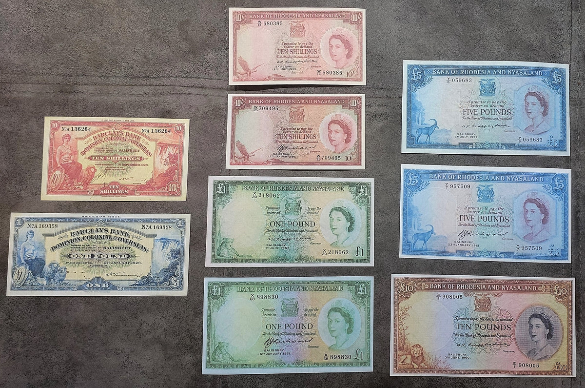 Full lot overview displaying all 9 historical banknotes (Barclays Bank Rhodesia and Bank of Rhodesia & Nyasaland issues, 1926–1961) in a structured arrangement.