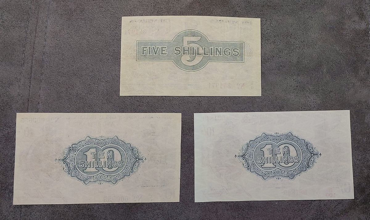Reverse engraving configurations of the iconic UK 1918 10 Shilling Bradbury treasury issues, displaying ornate central denomination medals and deep intaglio design contrast.