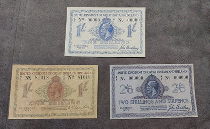United Kingdom 1919 series 2 Shillings and 6 Pence emergency currency. Features rare numismatic Specimen configurations, distinctive color-tinted backgrounds, and classic anti-counterfeiting guilloché engraving patterns.
