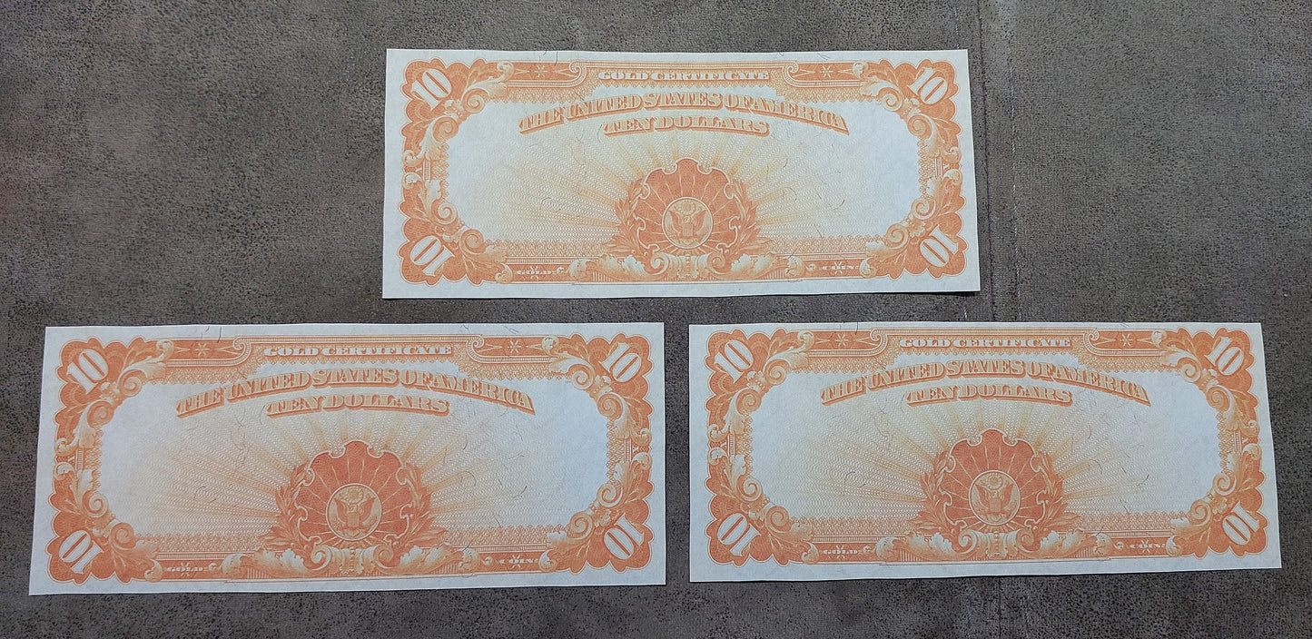 US 10 Dollar 1907 Gold Certificates reverse view showing golden yellow back artwork
